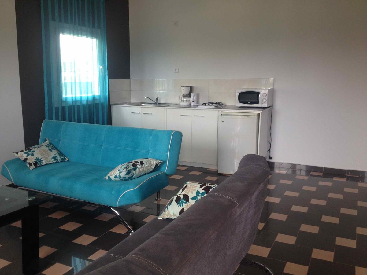 Residence Jardin Tropical Яунде Экстерьер фото